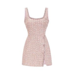 Mini Tweed dress with slit and rhinestone accents